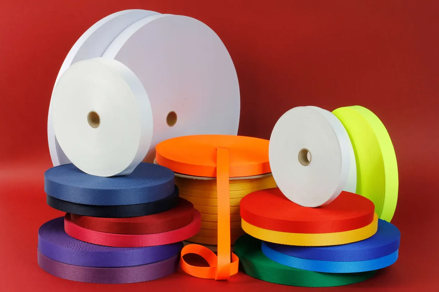Colorful textile webbing rolls ready for production lanyard