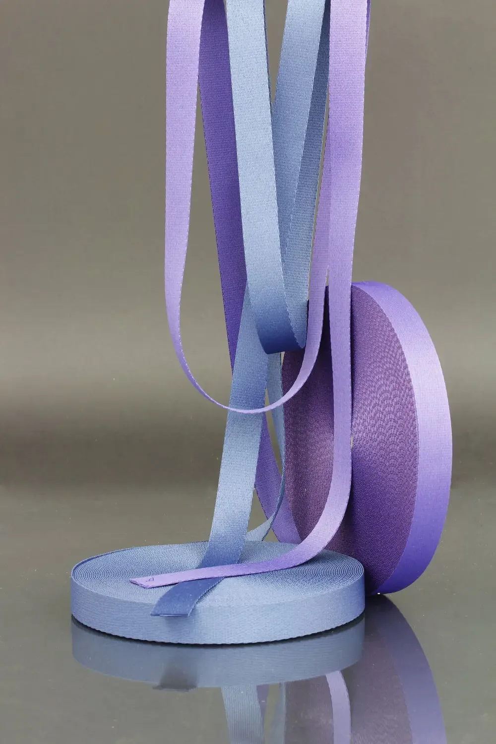 Purple textile webbing gurt with different widths